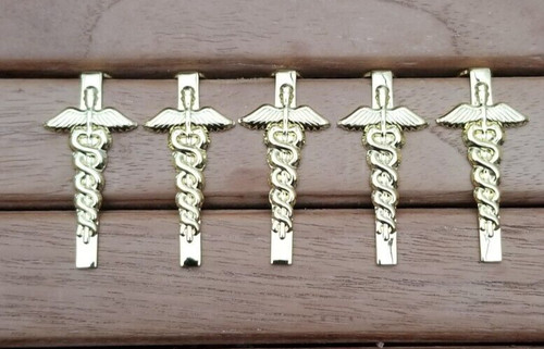 Gold plated caducess - ,