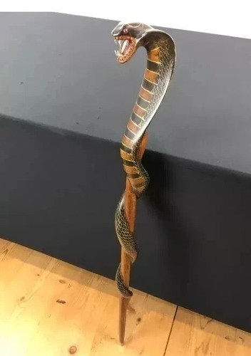 Wooden walking stick hand
