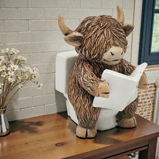 Happy Highland Cow on Loo