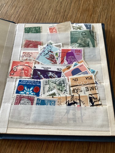 Old book assorted stamps - book,