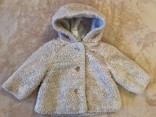 ‘NUTMEG’ GIRL’S FAUX FURRY PINK HOODED COAT 9-12 MONTHS