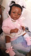 A beautiful wide awake African American toddler girl  doll 25 inch brown eyes