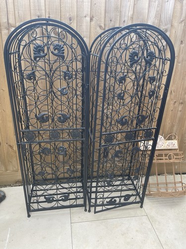 Large ornate metal wine bottle