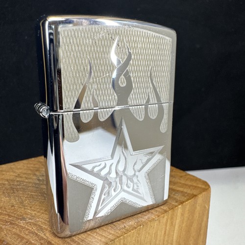 2006 zippo lighter - fire, star