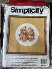 Simplicity Cross stitch kit  of puppies opened but Unused