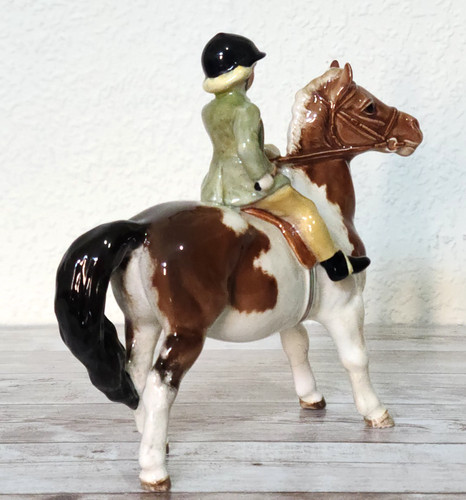 Beswick young girl skewbald - on,