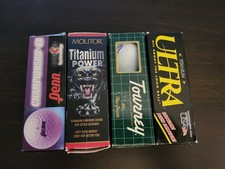Four Boxes of Golf Balls