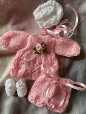 Hand Knitted dolls clothes to