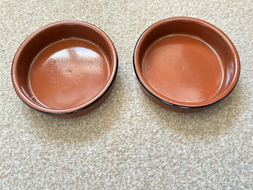 Pair terracotta glazed - of,