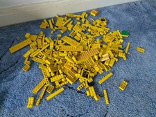 Mixed yellow lego bricks