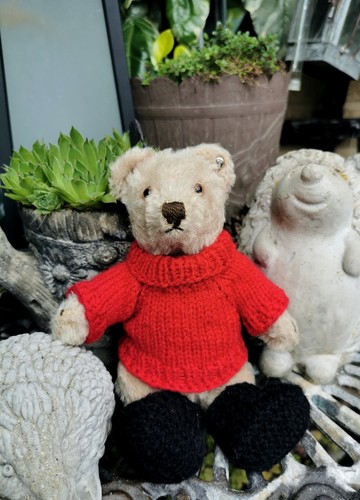 Hand knitted teddy bear - hand,