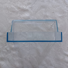 Used AEG sliding fridge door shelf in excellent condition.