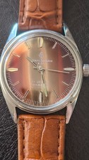HENRI SANDOZ 34mm 17 jewel INCABLOC Tiger Eye style dial watch
