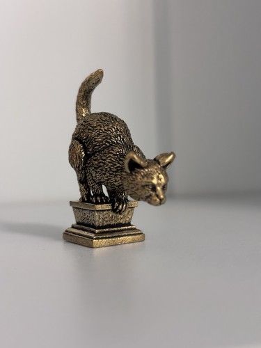 Small brass pouncing cat - brass,