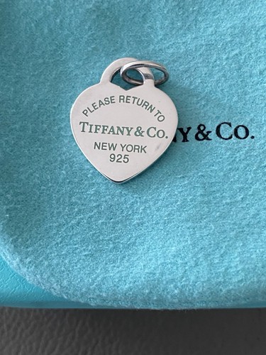 Tiffany please return to - &, co