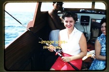 Woman on Deep Sea Fishing Boat