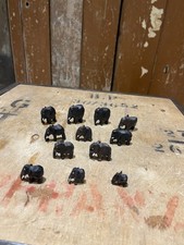 Tiny ebony Elephants Figures
