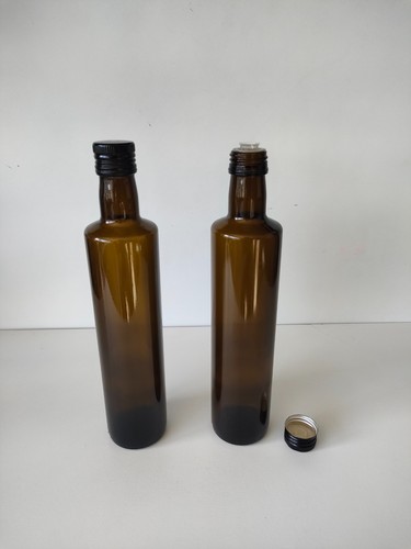 Empty olive oil bottles with - oil,