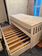 Captain bed with pull out trundle bed