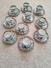 10 beautifully hand decorated Japanese  Coffee Cups and Saucers 