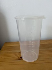 2X Plastic Measuring Beakers Plus Measuring Spoon