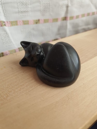 Sleeping cat sculpture - sleeping,