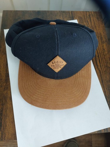 And men cap - and,