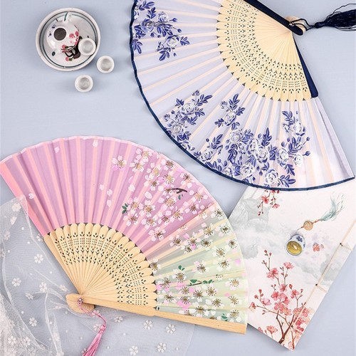 Hand fan held tela - hand,
