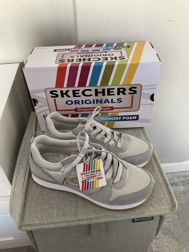 Skechers light grey trainers