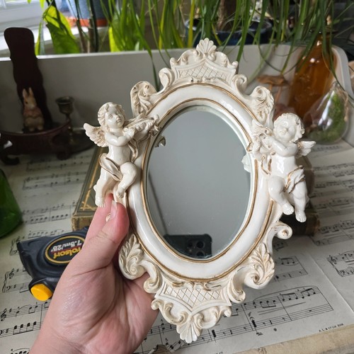 Vintage wall mirror cherub