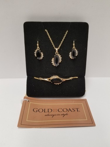 Gold coast black - &, white