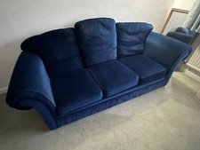 Navy blue plush velvet sofa