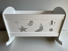 White solid wooden dolls
