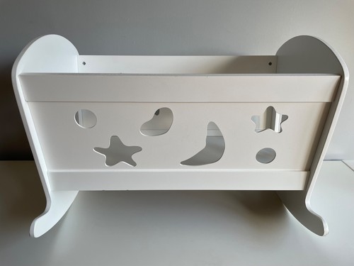 White solid wooden dolls