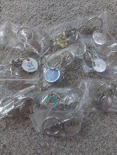 BUNDLE 10 VARIOUS DIFFERENT COLLECTABLE METAL SHOPPING TROLLEY TOKENS COINS. NEW