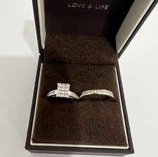 18 crt white gold and diamond ring set of two ernest jones size n 