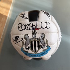 NEWCASTLE UNITED SIGNED