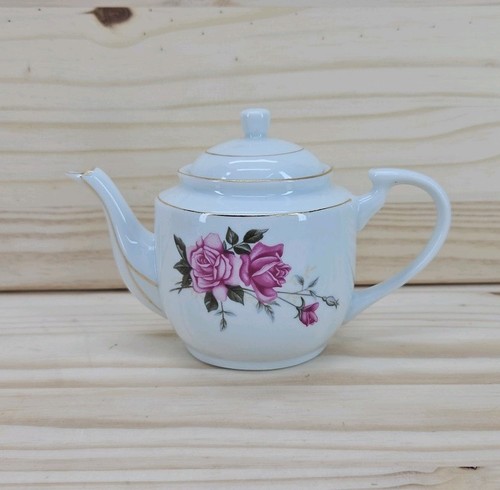 Small teapot with - small, floral