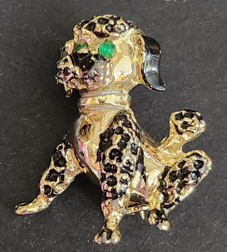 Gold tone and - and, poodle
