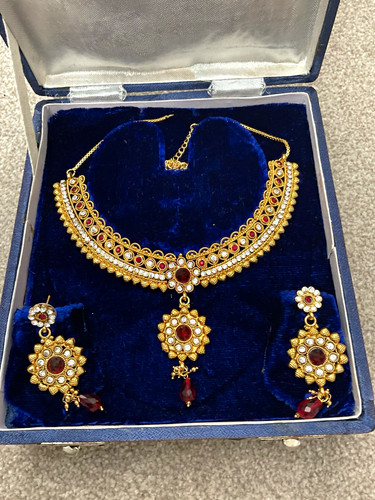 Gold colour red clear round - red,