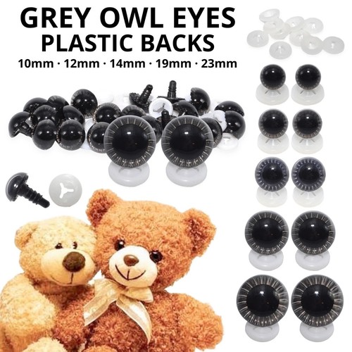 Grey owl eyes with plastic - owl,