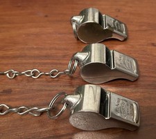 Three vintage Acme Thunder whistles