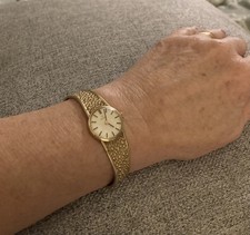 9ct GOLD - LADIES OMEGA WRISTWATCH - Integral strap vintage