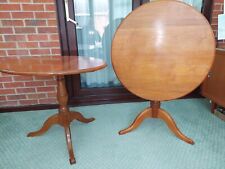 A pair of Victorian style circular flip / tilt top Occasional tables in walnut