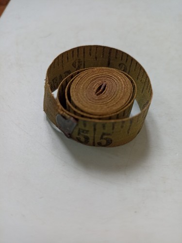 Old vintage dean tape measure - old,