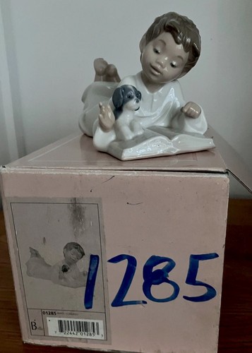 Lladro lovely boy teaching his - boy,