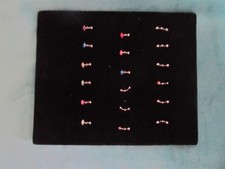 Job lot of 18 pieces of  body jewellery  plus new black velvet pad