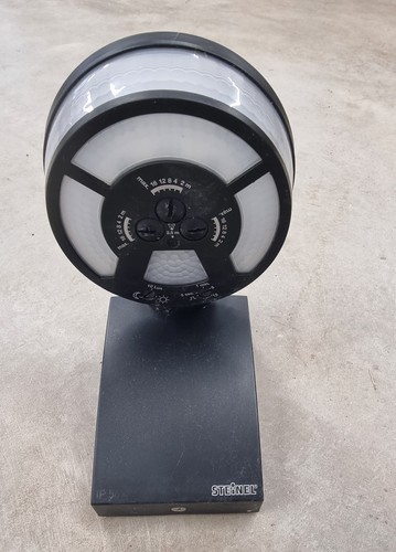 Motion and twilight sensor - and,