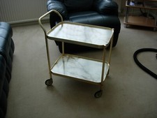 Hostess serving trolley on wheels