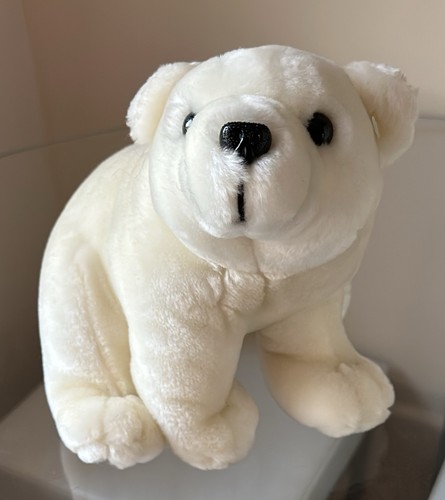 Cuddly sitting polar bear - cuddly,